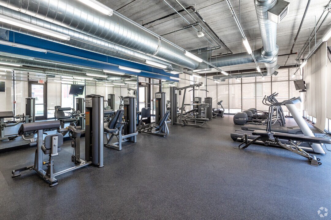 Fitness center with cardio machines and weight equipment at Court & Marketplace